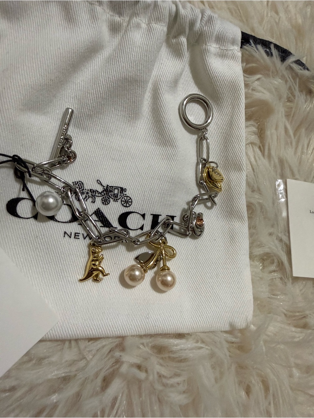 Coach Two-Tone Silver and Gold Pearl Charm Bracelet